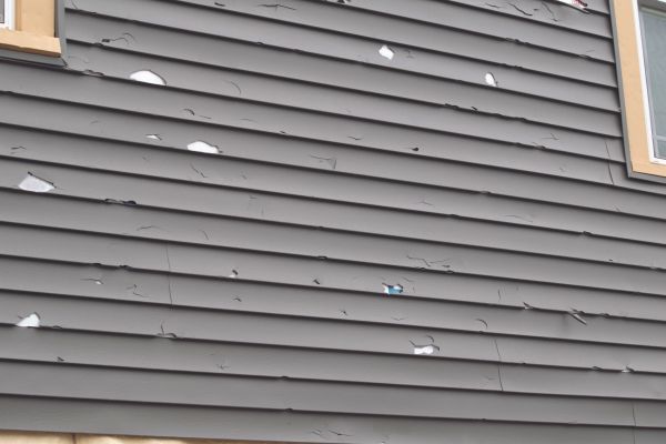 Damaged Siding Replacement in Renton